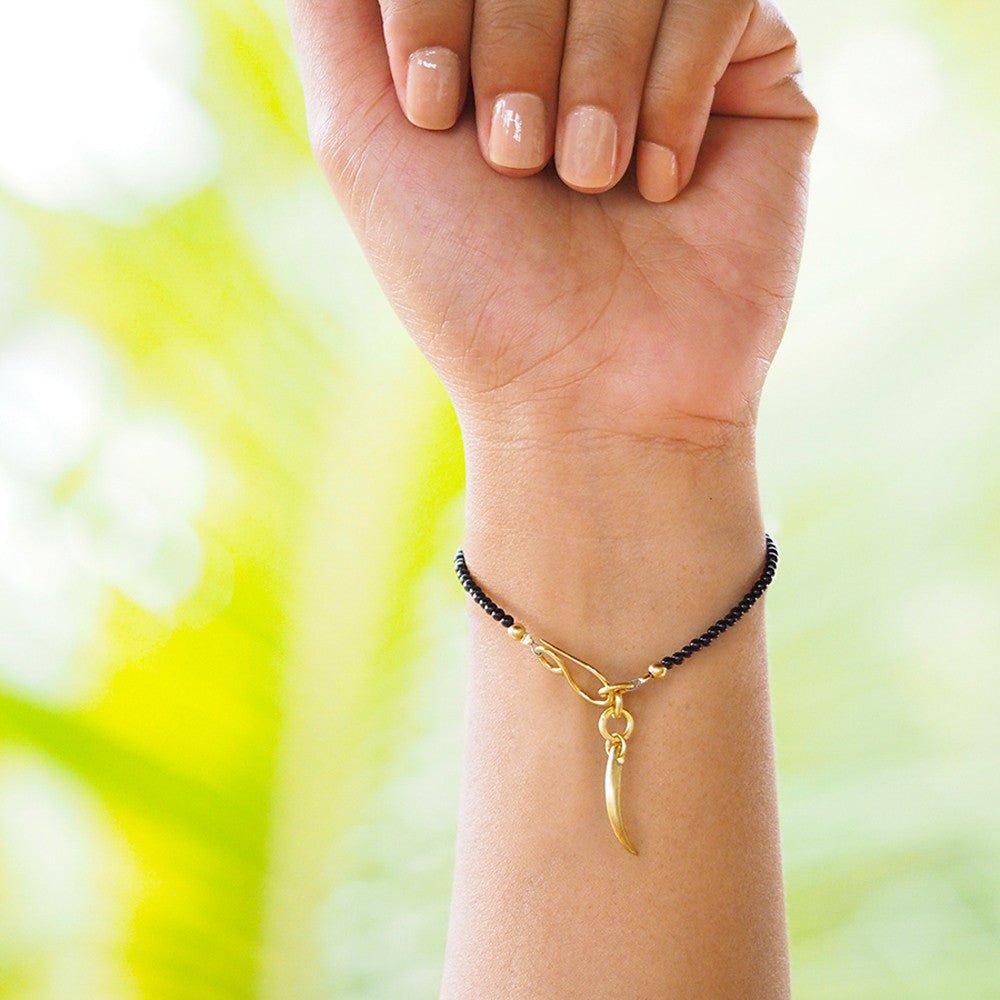 NIRMALA TINY BEAD BRACELET WITH FRANGIPANI - BLACK ONYX - BITS OF BALI JEWELRY